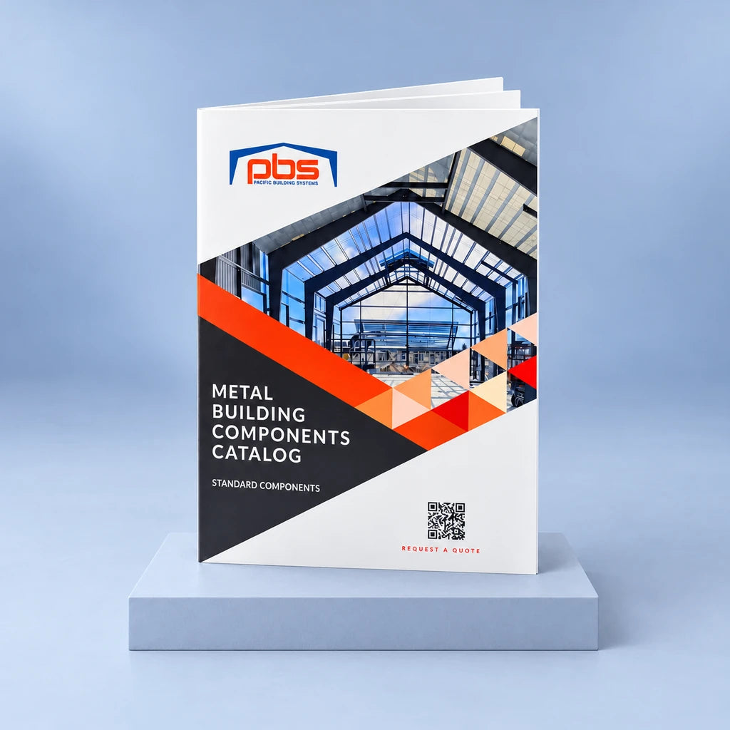 One Pacific Building Systems catalog standing on a low riser against a pale blue-gray studio backdrop.